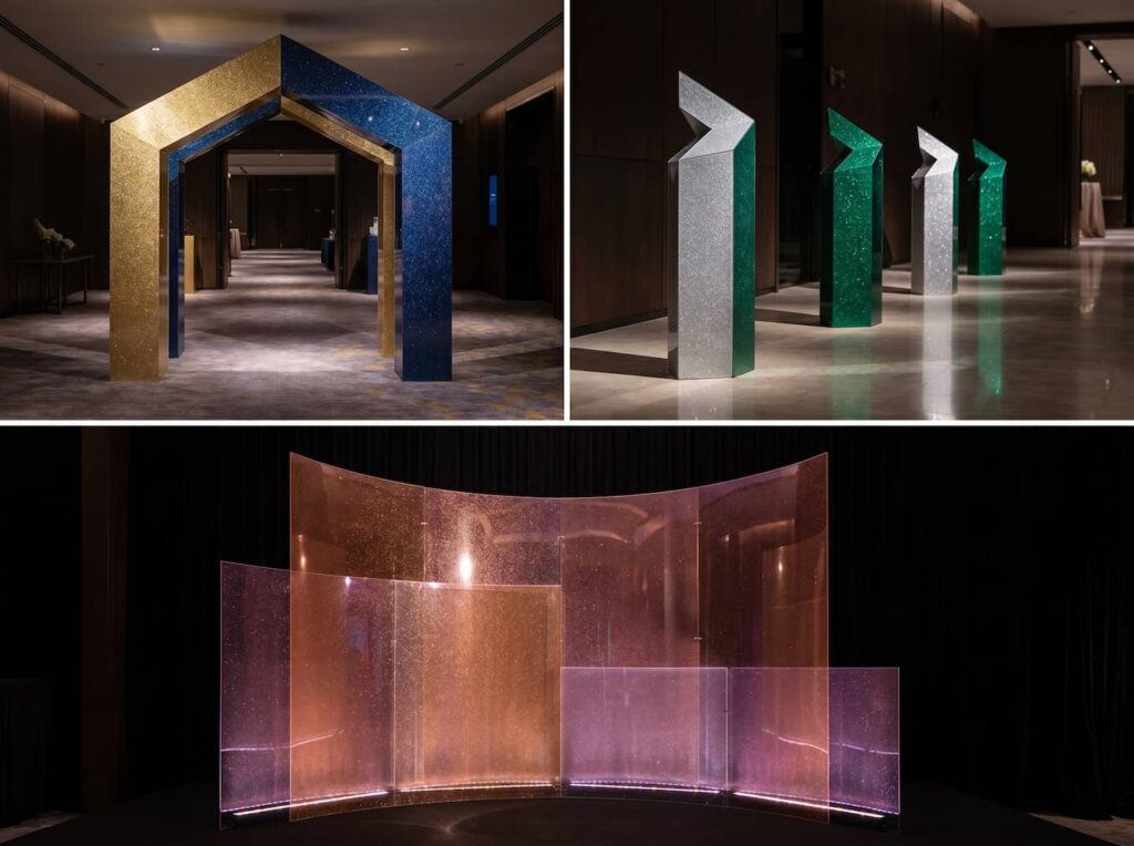 Luxury event decor featuring decorative arches and iridescent room dividers made from translucent pink and gold glitter acrylic sheets.