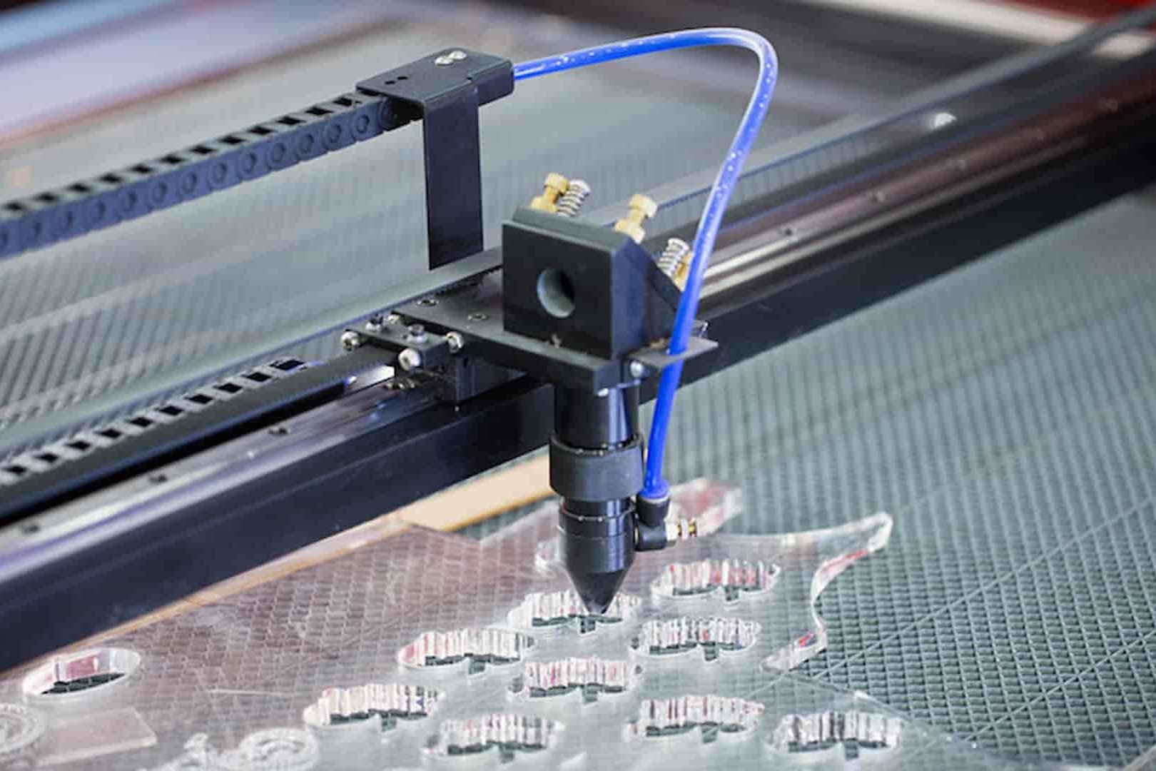 Custom laser engraving and cutting on clear plexiglass