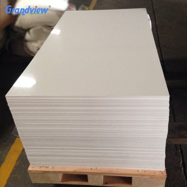 glossy-white-acrylic-sheets-stock Glossy white acrylic sheets stacked on a wooden pallet