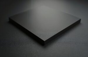 Opaque black acrylic sheet with a smooth glossy surface and clean finished edges