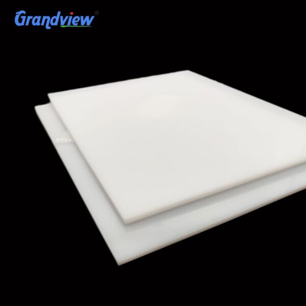 opaque-white-acrylic-sheets Opaque white acrylic sheets stacked against a black background